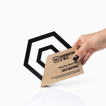 Modern geometric employee recognition award with oak base and black steel frame