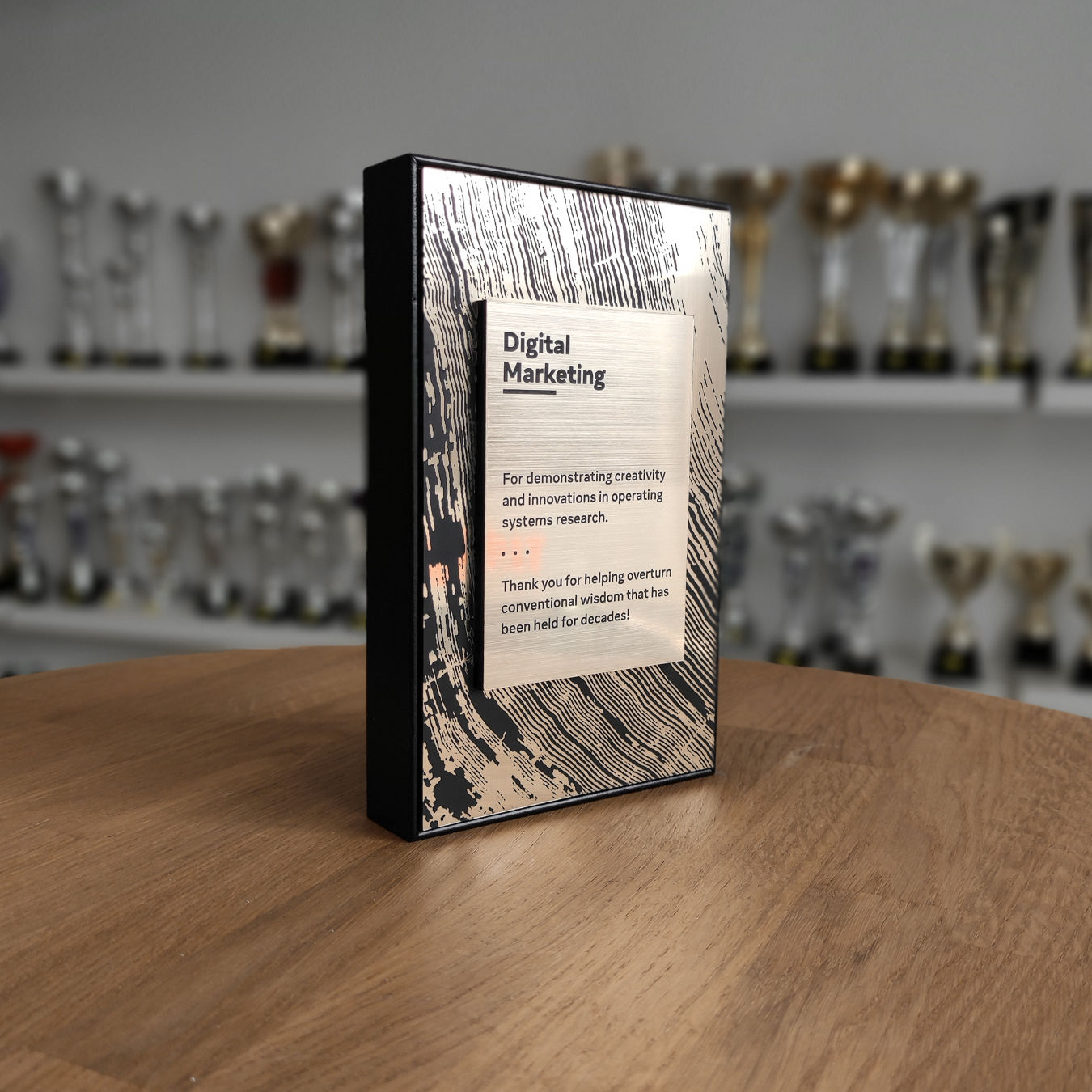 Custom employee recognition plaque with black and gold design